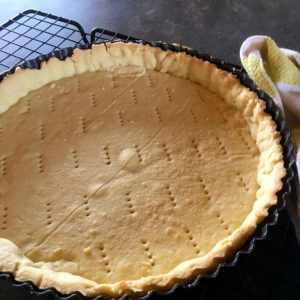 Sweet butter shortcrust pastry after it has been blind baked in a tart tin